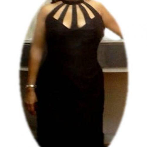 A Lynda Osborne client in black lattice-neck halter-style dress made precisely to
